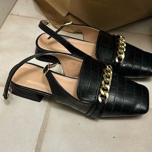 Off Brand mule shoes with strap.